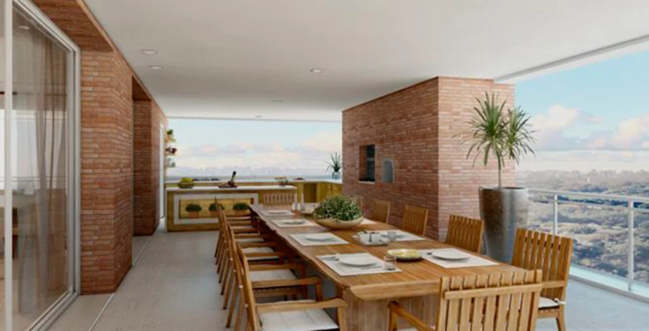 TERRAÇO GOURMET dos aptos de 407 m², com churrasqueira, guarda-corpo de vidro e espaço suficiente para receber bem todos seus melhores amigos.