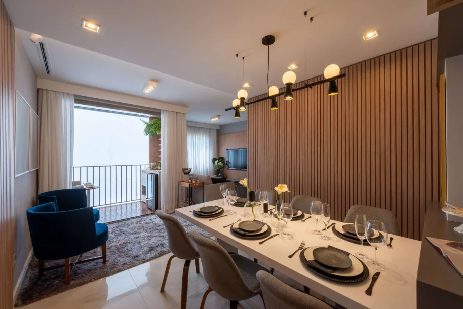 LIVING do apto de 61 m² com opção de terraço integrado ao living. Um espaço fluido que amplia o ambiente para receber amigos e família.